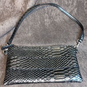 Devi Kroell wristlet   